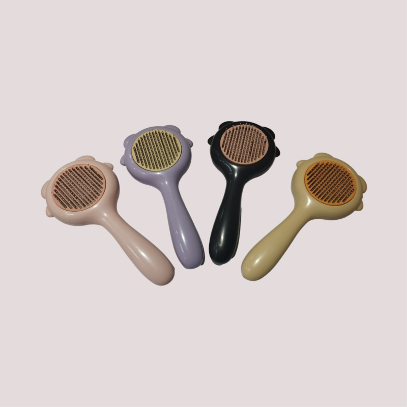 Brosse à poils rétractables pour chien et chat, vue 1